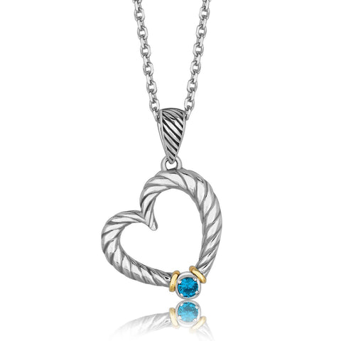 18K Yellow Gold and Sterling Silver Heart Style Pendant with a Blue Topaz