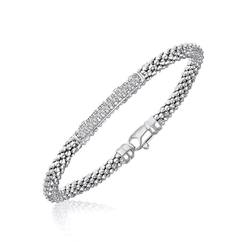 Sterling Silver Rhodium Finished Diamond Accented Popcorn Bangle (.14ct tw)