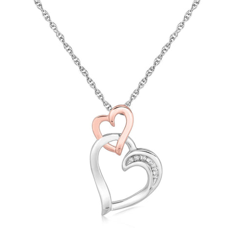 Sterling Silver Cascading Dual Heart Diamond Accented Pendant (.02 ct t.w.)