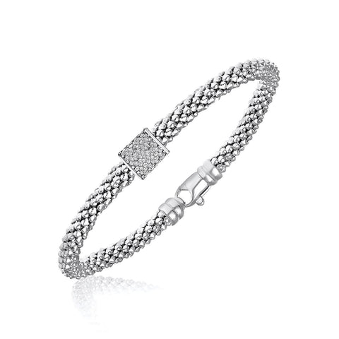 Sterling Silver Rhodium Plated Diamond Embellished Popcorn Bangle (.13ct tw)